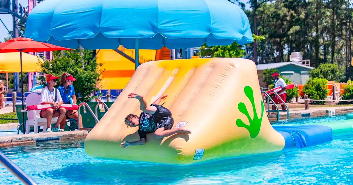 Boy falling down obstacle.