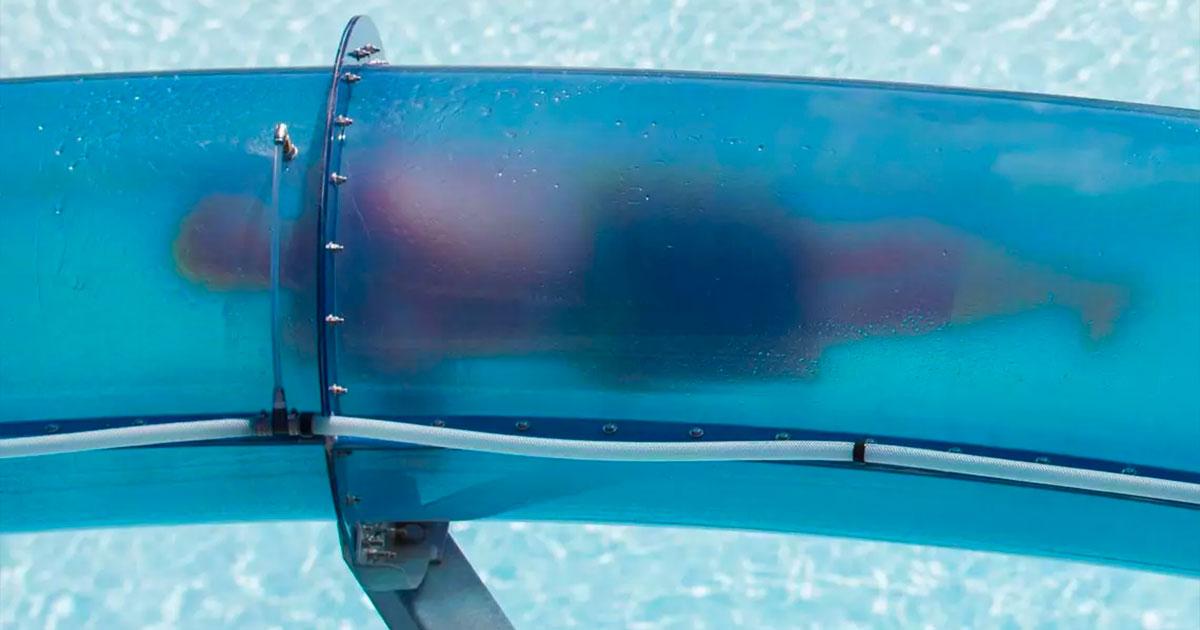 Person in clear tube