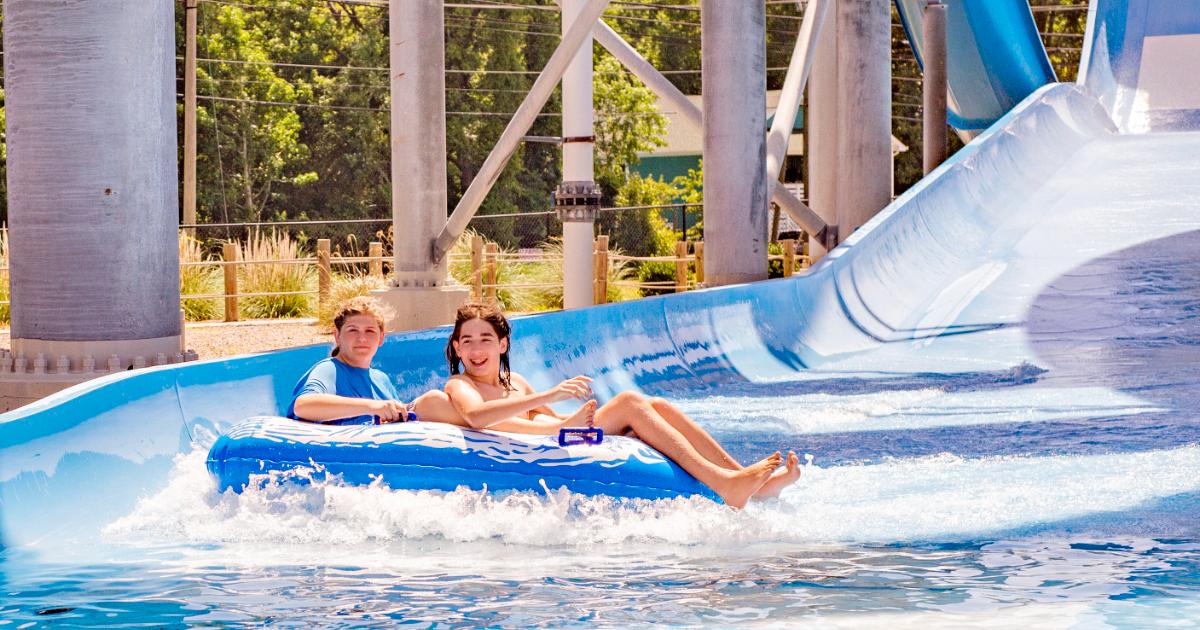Two boys in blue raft