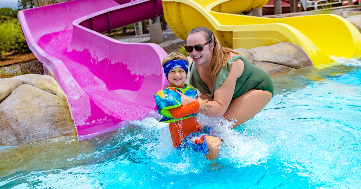 Mom and son purple slide