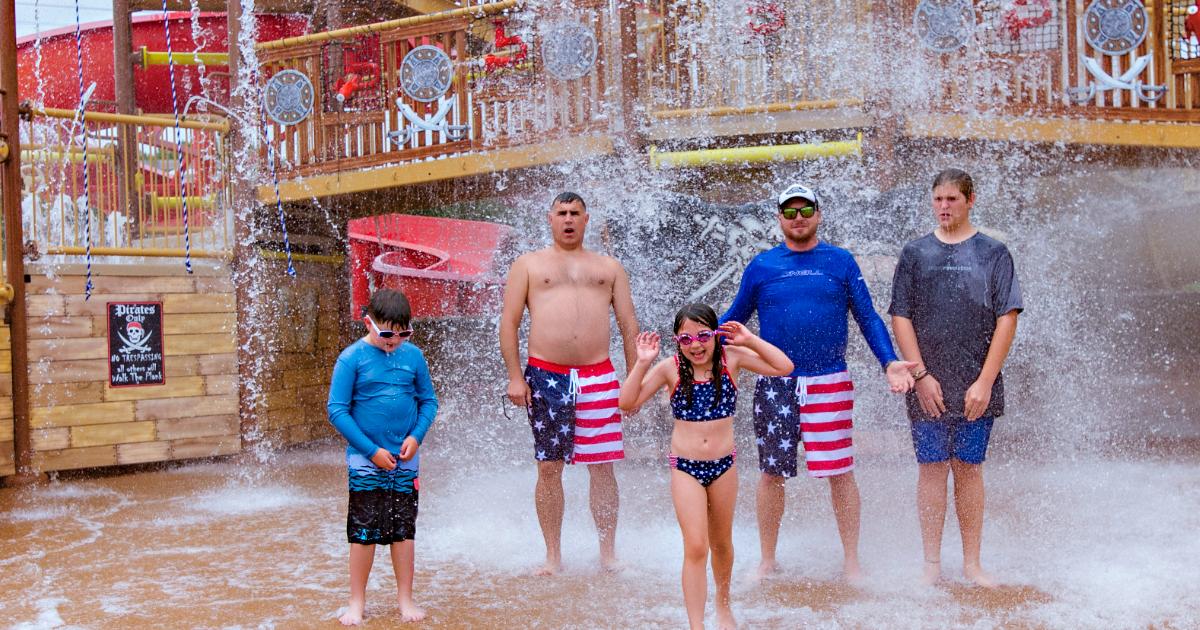 Group getting wet from bucket