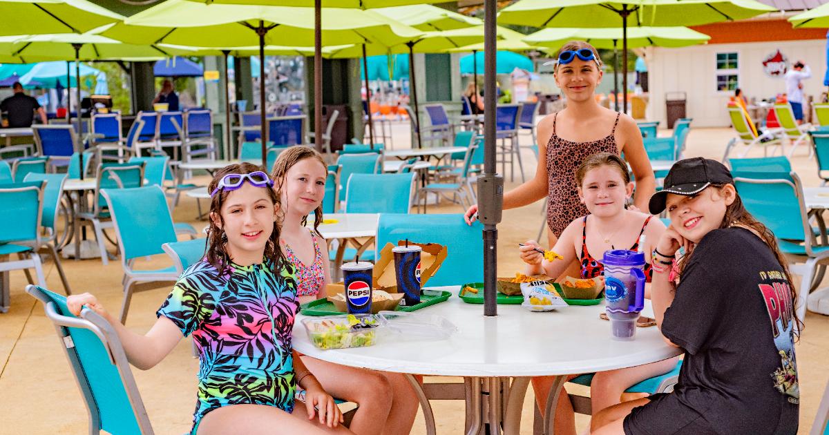 Three girls eating ice cream